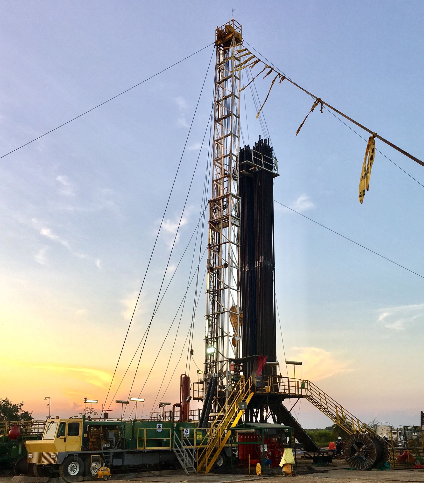 Drilling rig at sunset